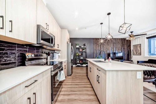 2103-55 Lucas Way Nw, Calgary, AB - Indoor Photo Showing Kitchen With Upgraded Kitchen
