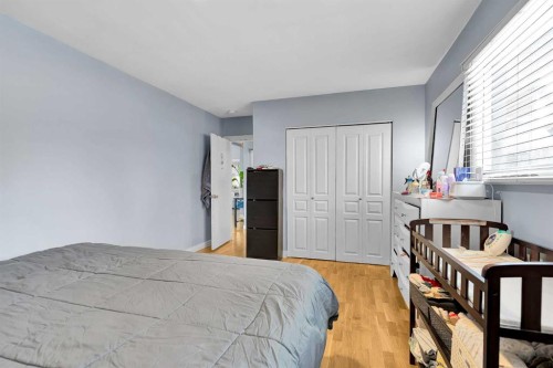 4617 Stanley Road Sw, Calgary, AB - Indoor Photo Showing Bedroom