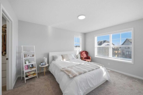 249 Masters Avenue Se, Calgary, AB - Indoor Photo Showing Bedroom