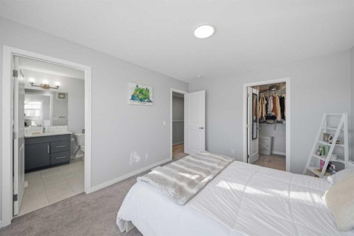 249 Masters Avenue Se, Calgary, AB - Indoor Photo Showing Bedroom
