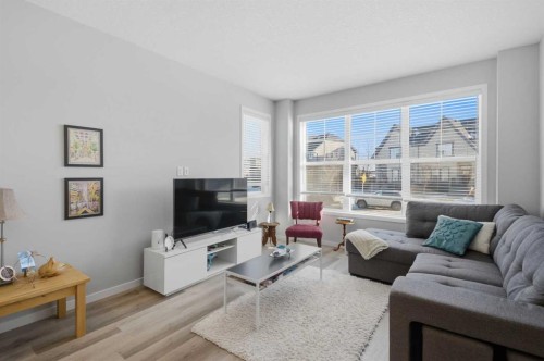 249 Masters Avenue Se, Calgary, AB - Indoor Photo Showing Living Room