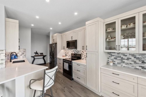 314-4500 50 Avenue, Olds, AB - Indoor Photo Showing Kitchen With Upgraded Kitchen