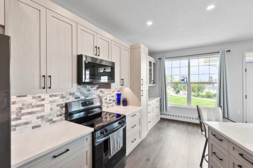 314-4500 50 Avenue, Olds, AB - Indoor Photo Showing Kitchen With Upgraded Kitchen