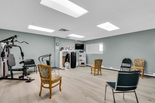 314-4500 50 Avenue, Olds, AB - Indoor Photo Showing Gym Room