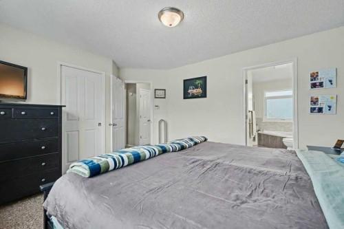 35 Somerglen Way Sw, Calgary, AB - Indoor Photo Showing Bedroom