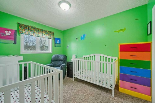 35 Somerglen Way Sw, Calgary, AB - Indoor Photo Showing Bedroom
