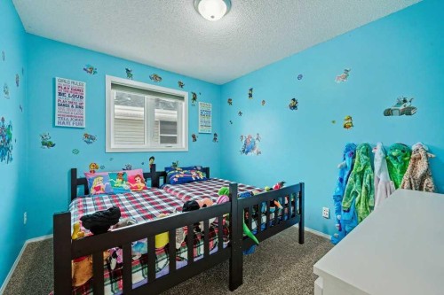 35 Somerglen Way Sw, Calgary, AB - Indoor Photo Showing Bedroom