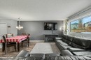 35 Somerglen Way Sw, Calgary, AB  - Indoor Photo Showing Living Room 