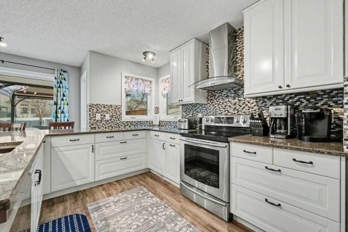 35 Somerglen Way Sw, Calgary, AB - Indoor Photo Showing Kitchen With Double Sink With Upgraded Kitchen