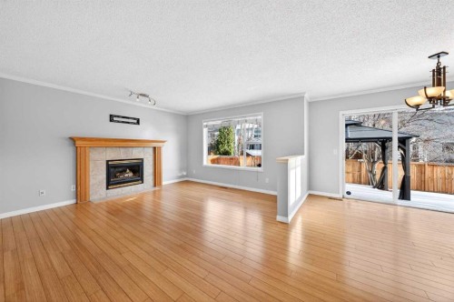 169 Harvest Grove Close Ne, Calgary, AB - Indoor Photo Showing Living Room With Fireplace