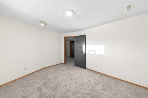 169 Harvest Grove Close Ne, Calgary, AB - Indoor Photo Showing Other Room