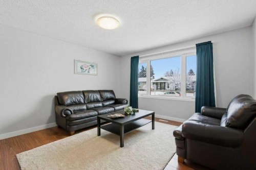 2708 Doverbrook Road Se, Calgary, AB - Indoor Photo Showing Living Room