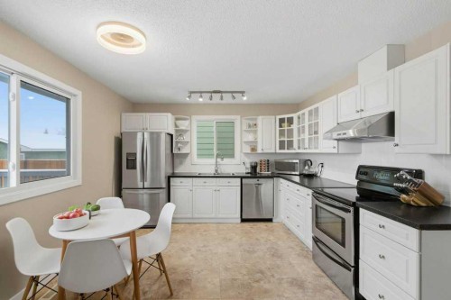 2708 Doverbrook Road Se, Calgary, AB - Indoor Photo Showing Kitchen With Stainless Steel Kitchen