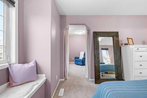 62 Canoe Circle Sw, Airdrie, AB - Indoor Photo Showing Bedroom