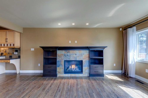 3140 46 Street Sw, Calgary, AB - Indoor Photo Showing Living Room With Fireplace