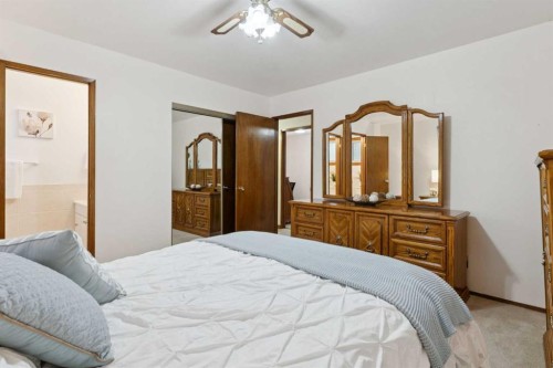 3221 Cedarille Drive Sw, Calgary, AB - Indoor Photo Showing Bedroom