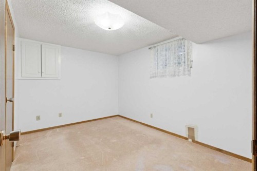 3221 Cedarille Drive Sw, Calgary, AB - Indoor Photo Showing Other Room