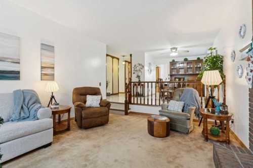 3221 Cedarille Drive Sw, Calgary, AB - Indoor Photo Showing Living Room