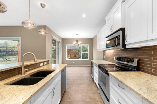18 Aspen Hills Manor Sw, Calgary, AB - Indoor Photo Showing Kitchen With Double Sink With Upgraded Kitchen