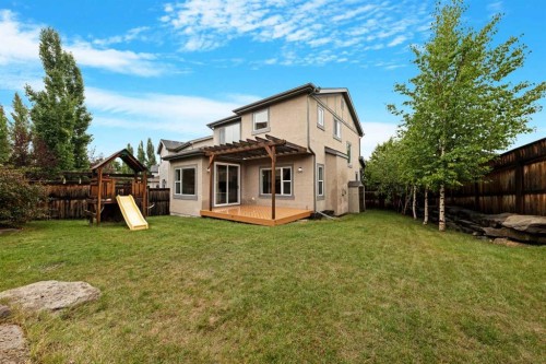18 Aspen Hills Manor Sw, Calgary, AB - Outdoor With Backyard