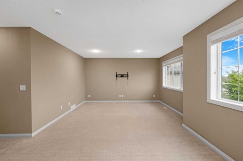 18 Aspen Hills Manor Sw, Calgary, AB - Indoor Photo Showing Other Room