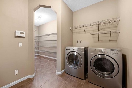 18 Aspen Hills Manor Sw, Calgary, AB - Indoor Photo Showing Laundry Room