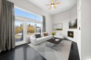 213 Copperfield Lane Se, Calgary, AB  - Indoor Photo Showing Living Room With Fireplace 