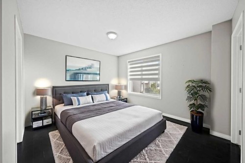 213 Copperfield Lane Se, Calgary, AB - Indoor Photo Showing Bedroom