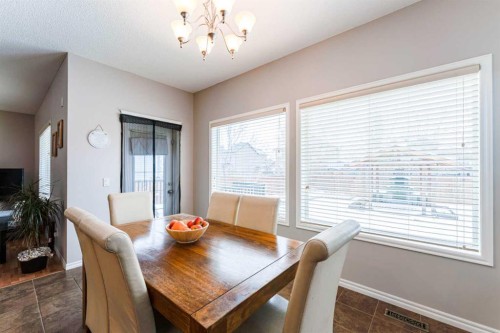 461 Boulder Creek Way Se, Langdon, AB - Indoor Photo Showing Dining Room