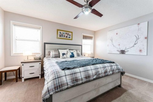 461 Boulder Creek Way Se, Langdon, AB - Indoor Photo Showing Bedroom