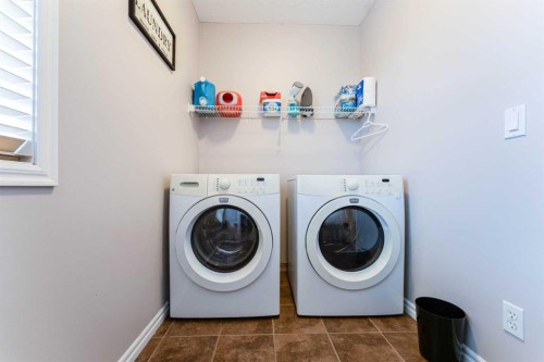 461 Boulder Creek Way Se, Langdon, AB - Indoor Photo Showing Laundry Room