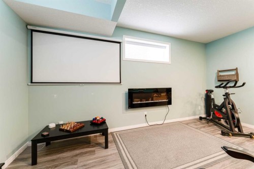 461 Boulder Creek Way Se, Langdon, AB - Indoor Photo Showing Gym Room