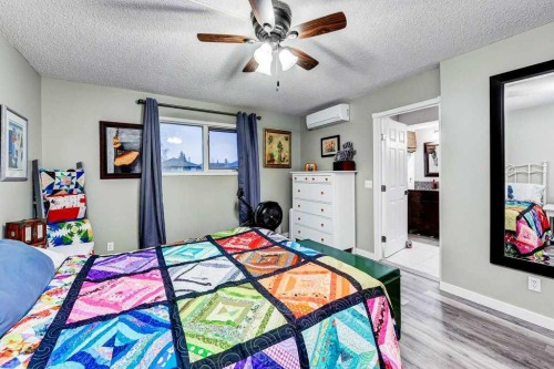 28 Hawktree Circle Nw, Calgary, AB - Indoor Photo Showing Bedroom