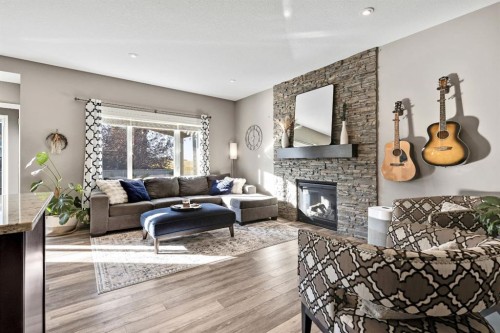 129 Wildrose Green, Strathmore, AB - Indoor Photo Showing Living Room With Fireplace