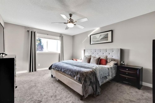 129 Wildrose Green, Strathmore, AB - Indoor Photo Showing Bedroom
