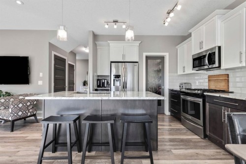 129 Wildrose Green, Strathmore, AB - Indoor Photo Showing Kitchen With Stainless Steel Kitchen With Upgraded Kitchen