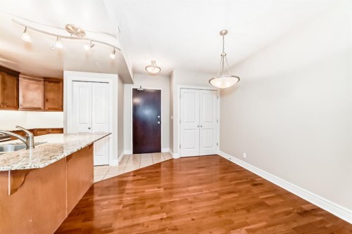 701-920 5 Avenue Sw, Calgary, AB - Indoor Photo Showing Kitchen With Double Sink