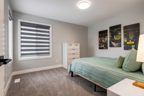 18 South Shore Bay, Chestermere, AB - Indoor Photo Showing Bedroom