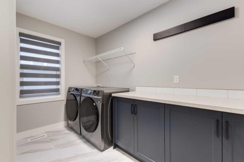 18 South Shore Bay, Chestermere, AB - Indoor Photo Showing Laundry Room