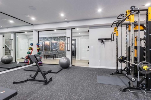 18 South Shore Bay, Chestermere, AB - Indoor Photo Showing Gym Room