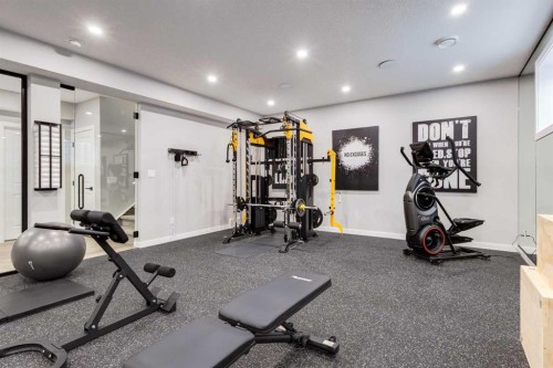 18 South Shore Bay, Chestermere, AB - Indoor Photo Showing Gym Room