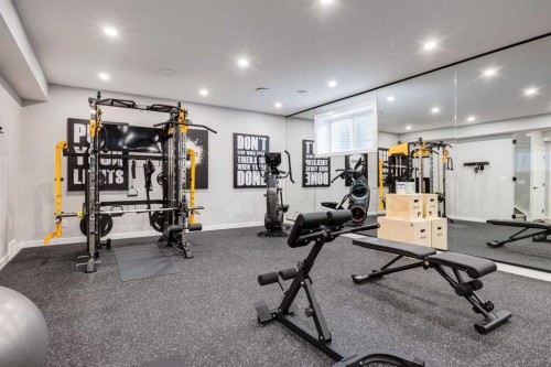 18 South Shore Bay, Chestermere, AB - Indoor Photo Showing Gym Room