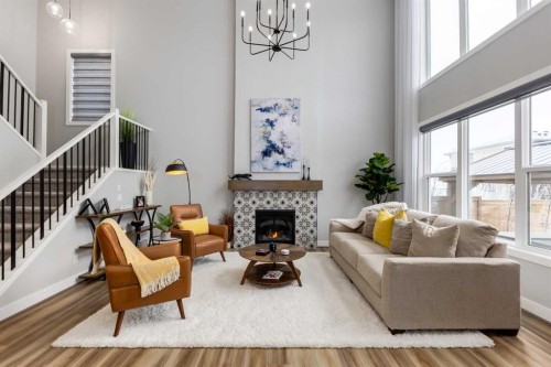 18 South Shore Bay, Chestermere, AB - Indoor Photo Showing Living Room With Fireplace