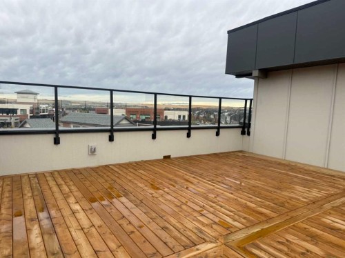 1116-520 Reynolds Avenue Sw, Airdrie, AB - Outdoor With Deck Patio Veranda With Exterior