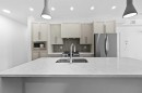 1116-520 Reynolds Avenue Sw, Airdrie, AB  - Indoor Photo Showing Kitchen With Upgraded Kitchen 