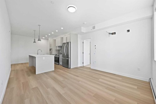 1116-520 Reynolds Avenue Sw, Airdrie, AB - Indoor Photo Showing Kitchen