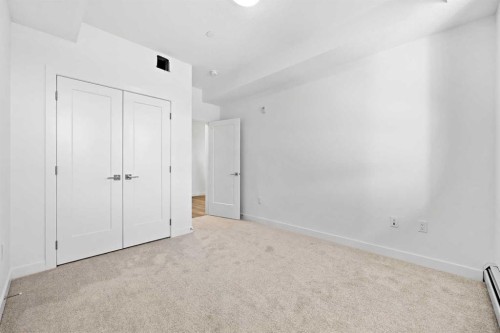 1116-520 Reynolds Avenue Sw, Airdrie, AB - Indoor Photo Showing Other Room