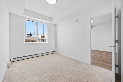 1116-520 Reynolds Avenue Sw, Airdrie, AB - Indoor Photo Showing Other Room