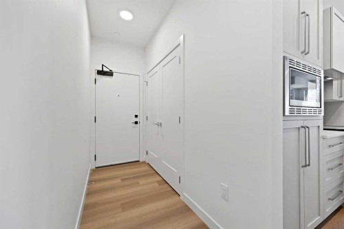 1116-520 Reynolds Avenue Sw, Airdrie, AB - Indoor Photo Showing Other Room