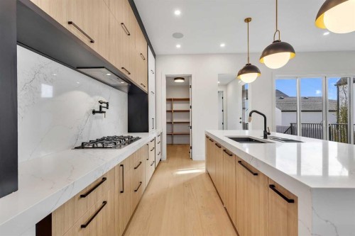 342 Normandy Drive Sw, Calgary, AB - Indoor Photo Showing Kitchen With Upgraded Kitchen